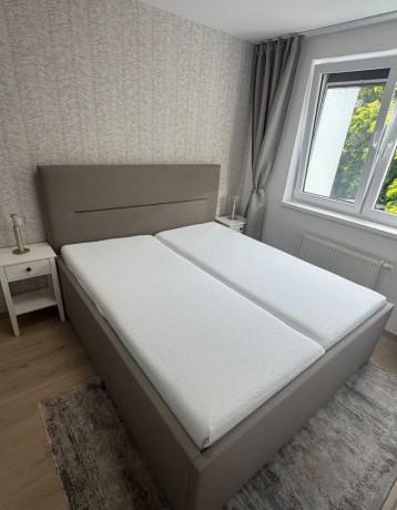 luxusna-calunena-postel-215x190cm-s-elektrickymi-rostami-big-0