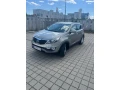 kia-sportage-hneda-metaliza-small-0