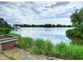 rekreacna-chata-pri-jazere-v-prvom-rade-pozemok-vyhlad-small-0