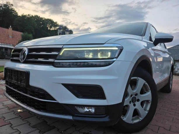 volkswagen-tiguan-vw-20tdi-scr-bmt-highline-dsg-a7-110kw-eu6-5d2016-2018-big-0
