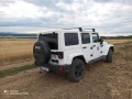 jeep-wrangler-28-crd-sahara-at-147kw200hp-a5-small-0
