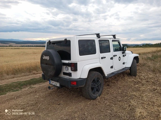 jeep-wrangler-28-crd-sahara-at-147kw200hp-a5-big-0