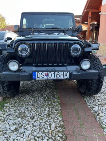 jeep-wrangler-40-sahara-at-130kw177hp-a4-big-0